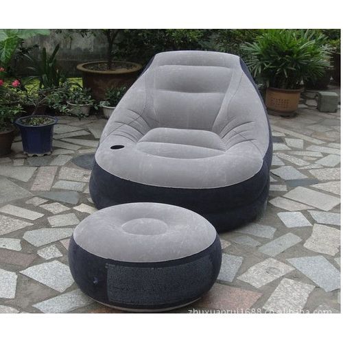 Inflatable seat with foot rest